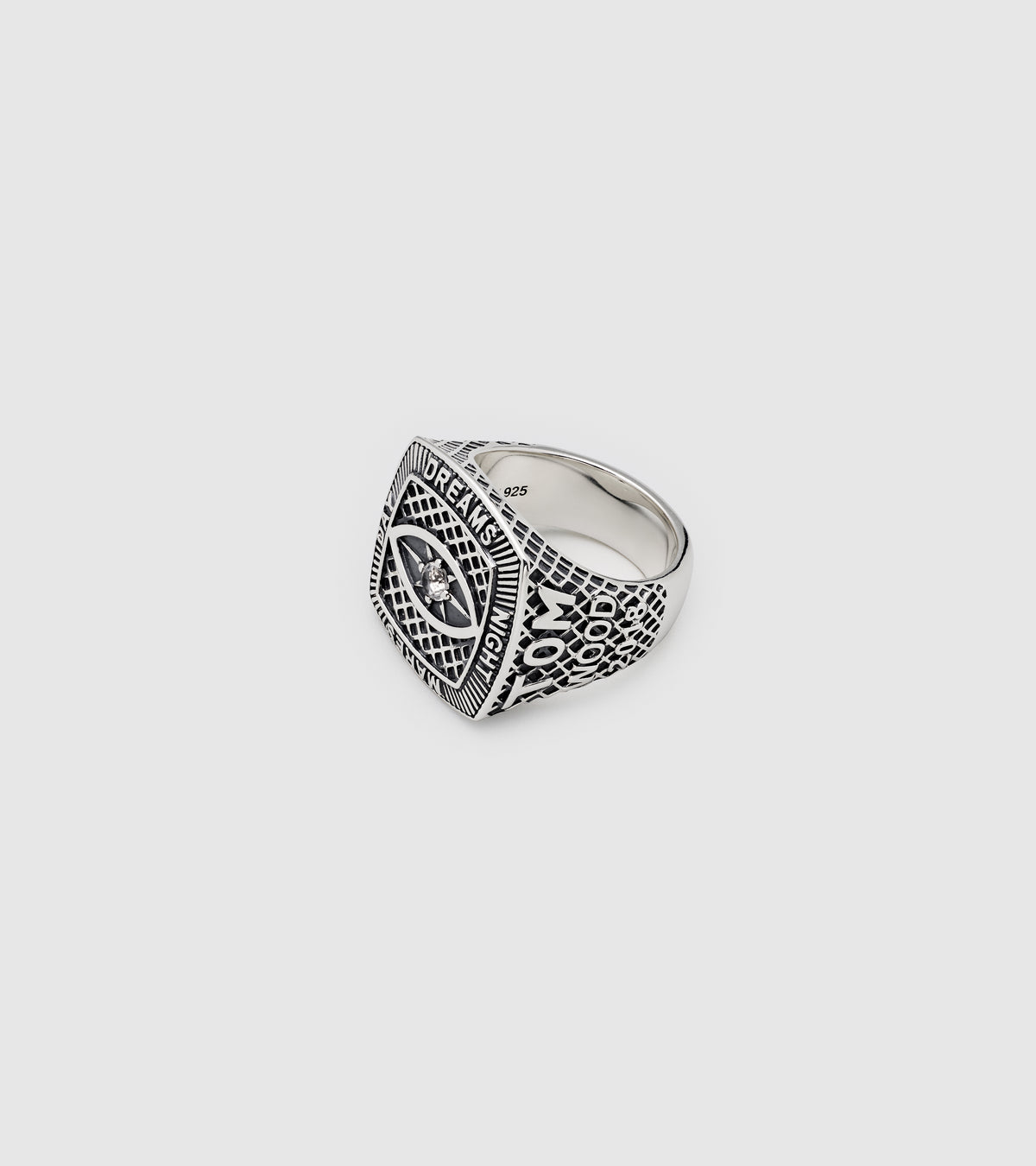 A silver signet ring with a textured, diamond-patterned band, shown from a top-down view on a light gray background.