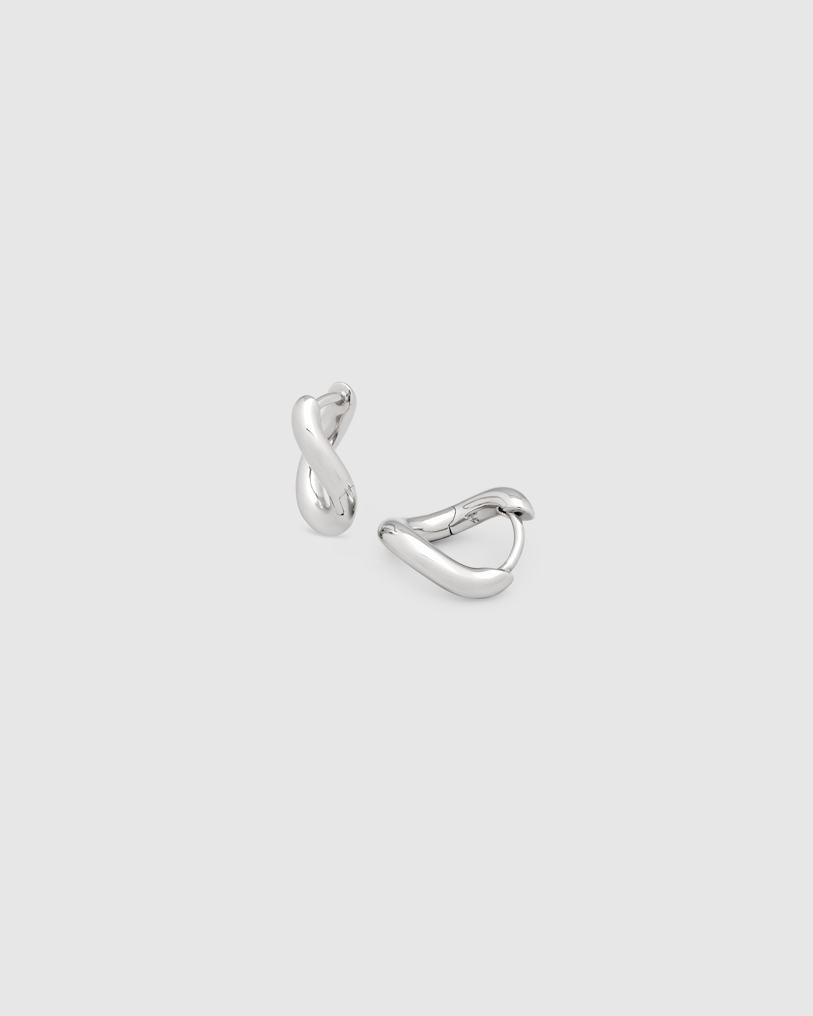 ピアス – Tom Wood
