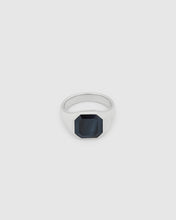 Tom Wood Dan Ring Blue Hawk Eye 925 Sterling Silver - A silver signet ring with a dark, faceted geometric center stone