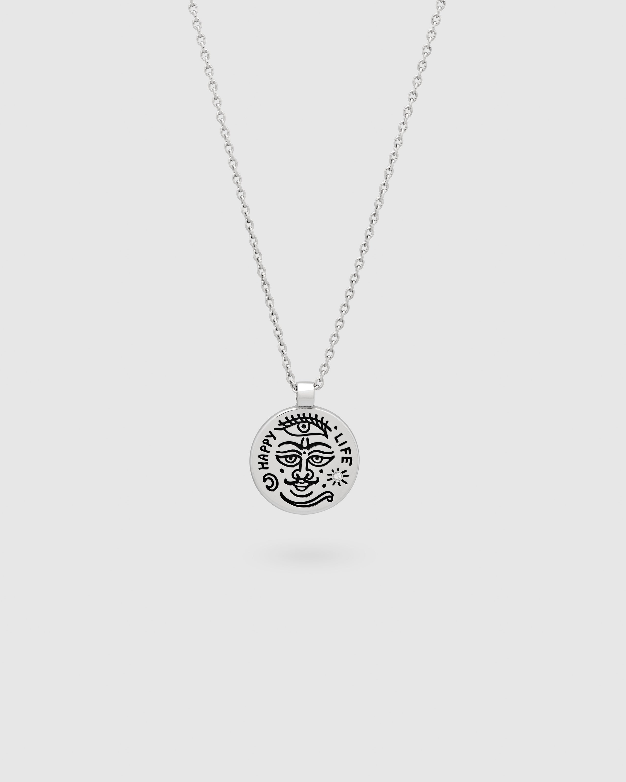 925 sterling Silver necklace with a silver pendant with black antiquing on a white background